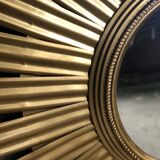 Sun mirror "André" in gilded sheet metal witch eye