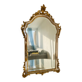 Large golden mirror parecloses