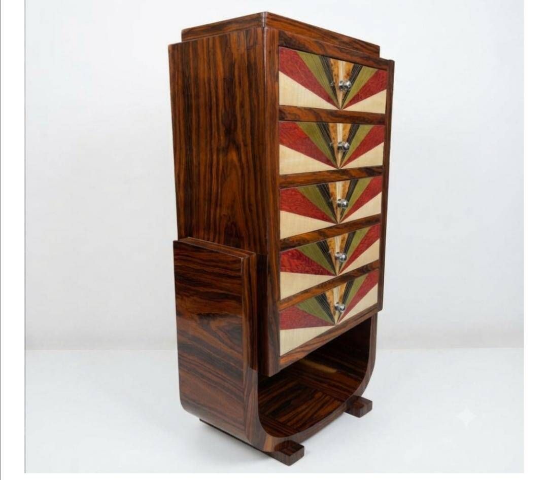 An Art Deco chest of drawers with five beech and rosewood drawers.