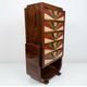An Art Deco chest of drawers with five beech and rosewood drawers.