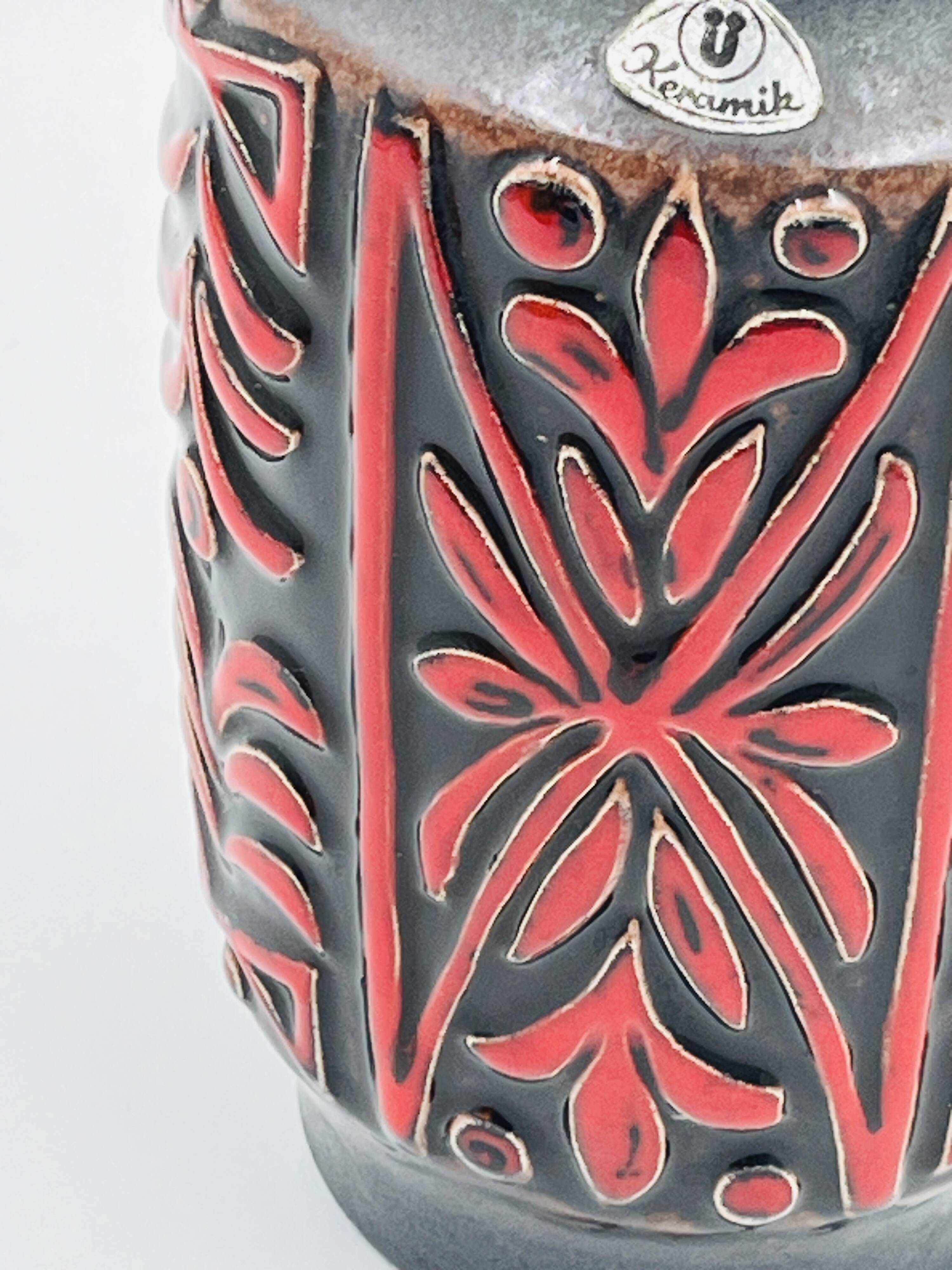Vase West Germany, ceramic relief, red, 1970s.