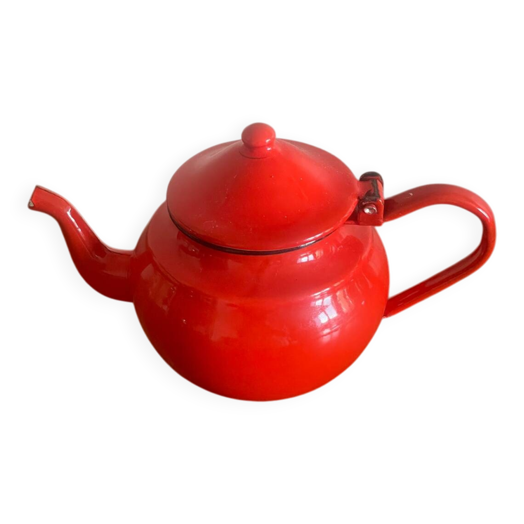 Red enamelled sheet metal teapot