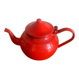 Red enamelled sheet metal teapot