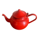 Red enamelled sheet metal teapot