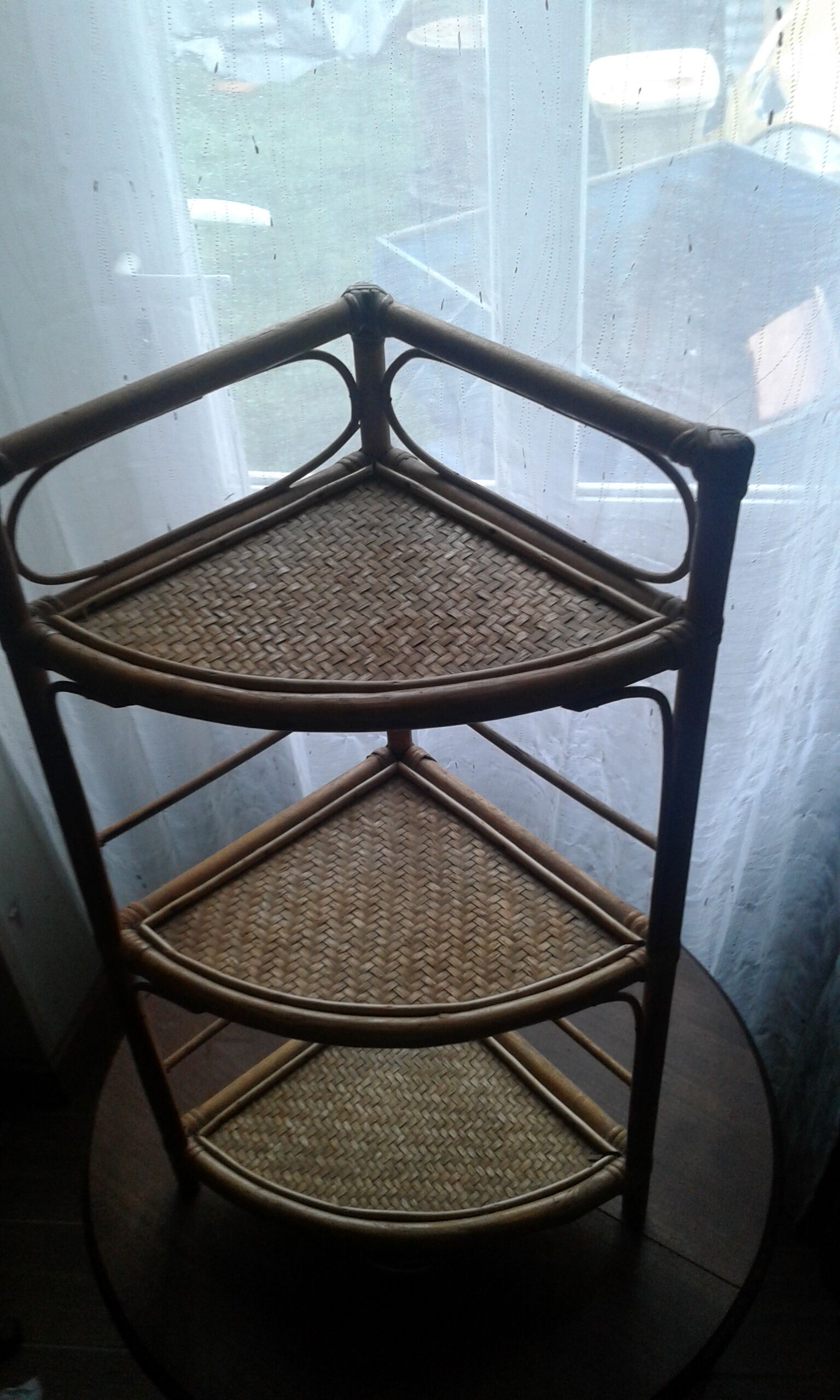 Rattan corner shelf