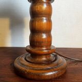 Table lamp with carved wooden base