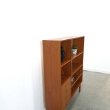 Deens teak vakkenkast met lades en hoge poten, vintage wandkast