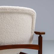 Pair of “Tiki” lounge chairs in teak and bouclé Busnelli Italy 1960