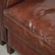 Dark cognac-coloured set of 2 sheepskin armchairs with a sleek design