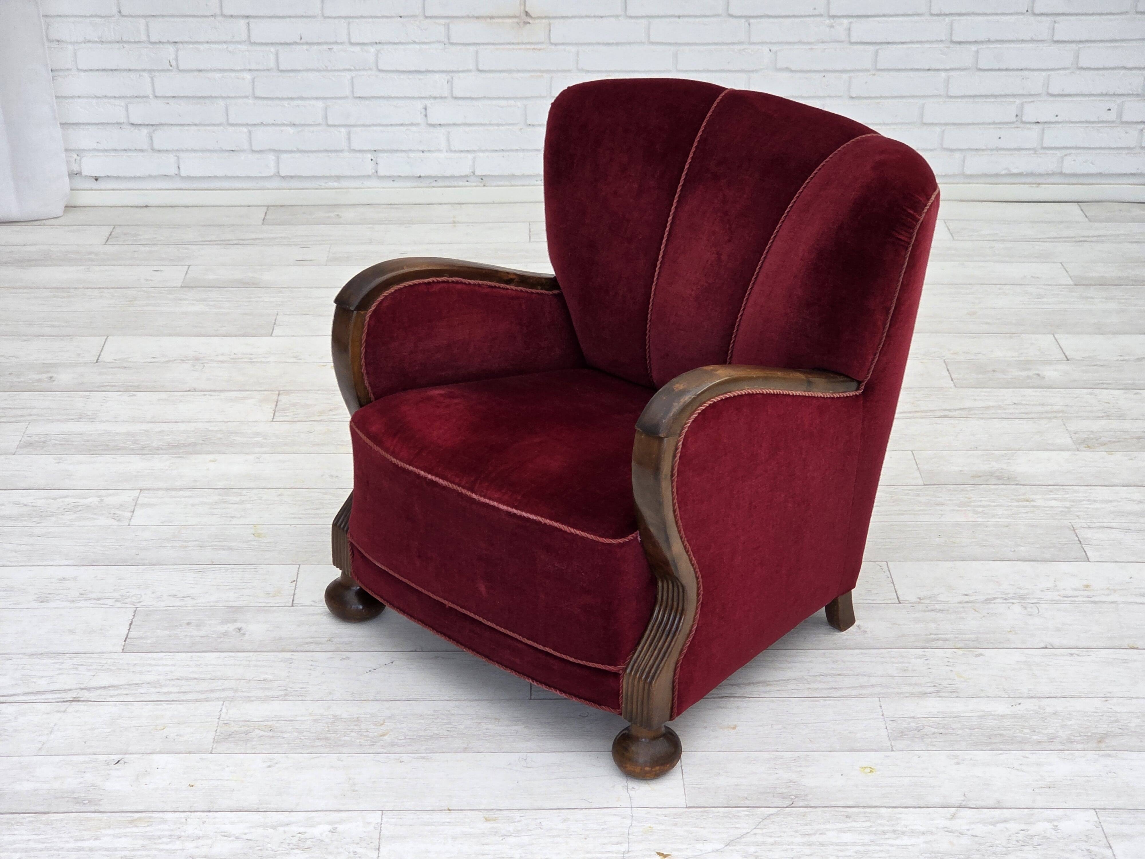 1950s, Danish relax armchair, cherry-red furniture velour, dark beech wood.