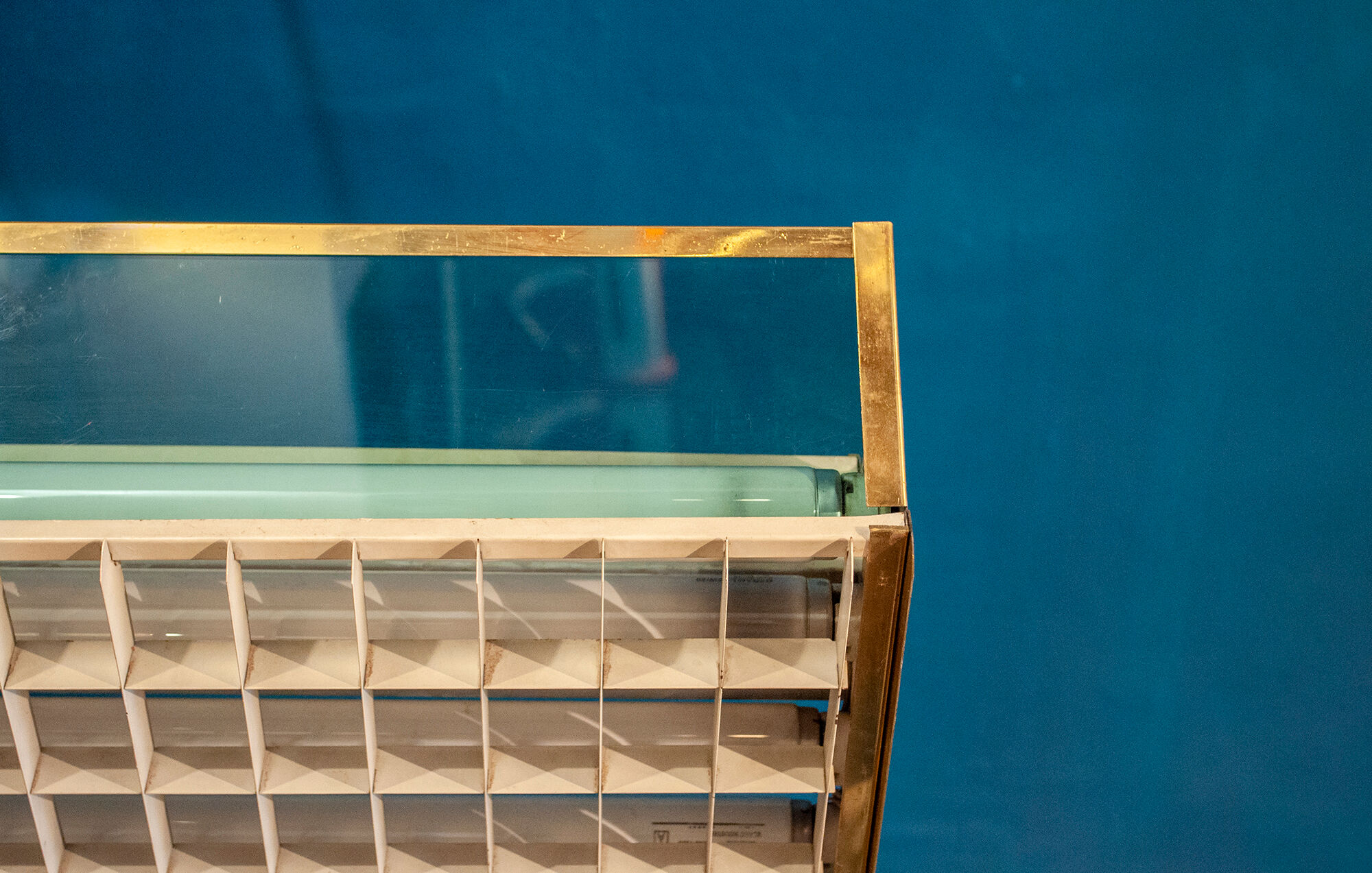 Four brass, aluminum and plexiglas ceiling panels. Italy 1950s