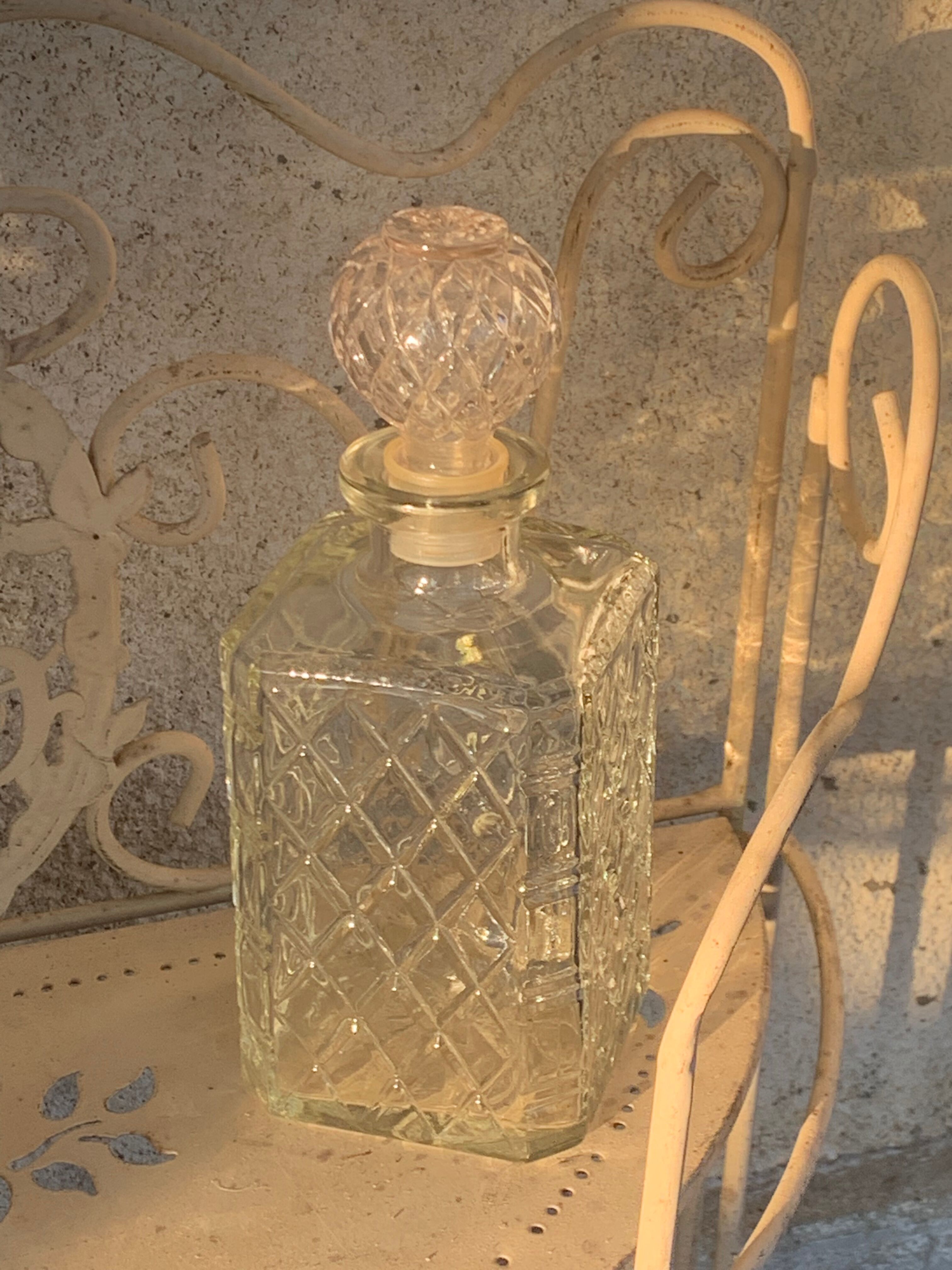 Vintage transparent molded glass whisky decanter