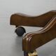 Chesterfield office chair in English style made of cow leather and wood.