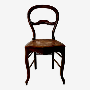 Antique chair sitting cannage