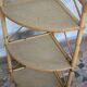 Pair of rattan shelves including a corner shelf