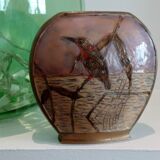 Brass vase with bird décor