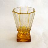 Art Deco vase engraved with flowers, faceted body on a pedestal.