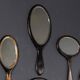 Collection antique du 19ème siècle de vingt-cinq miroirs à main en bois