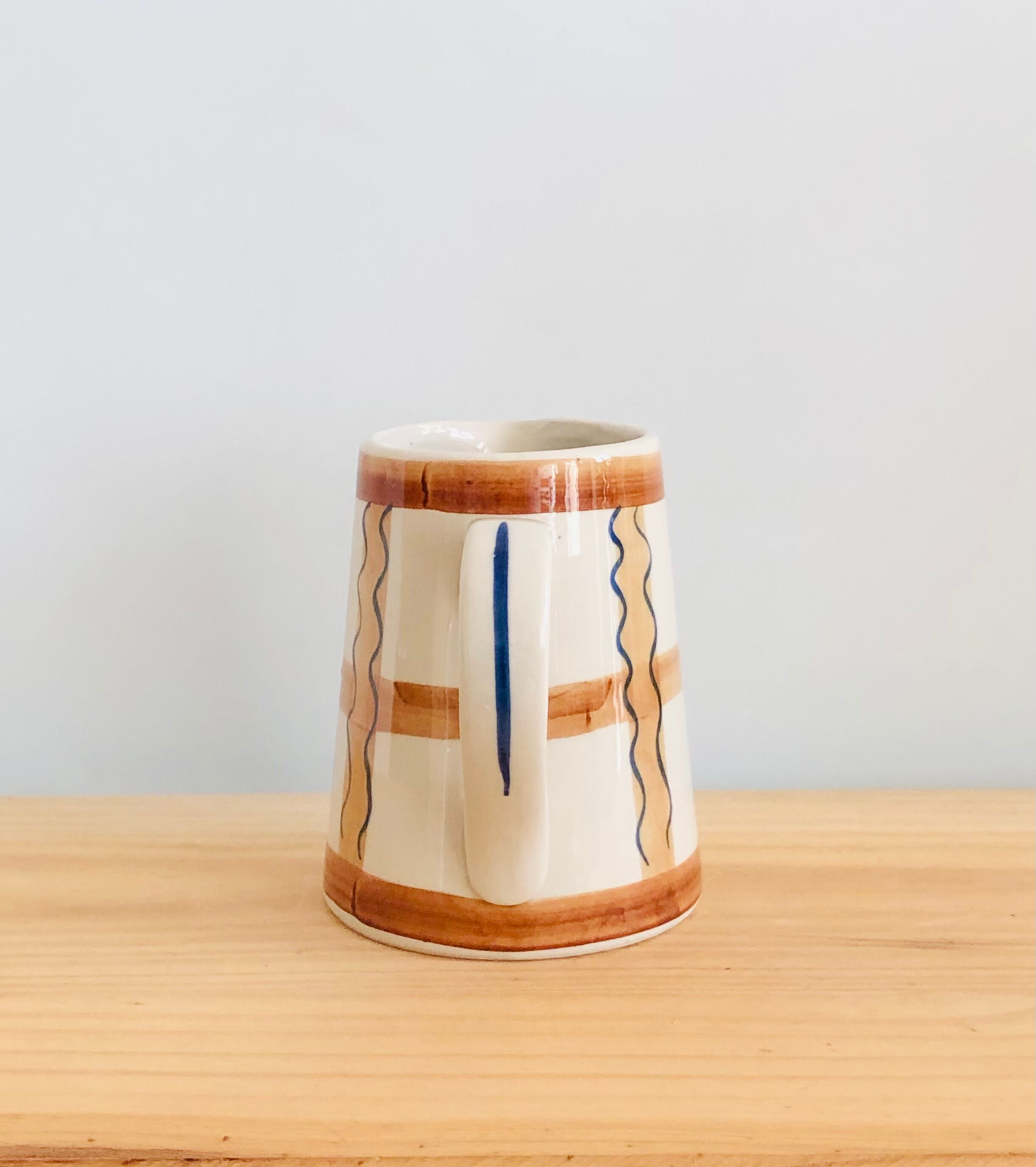 Vintage graphic pitcher in hand-painted ceramic