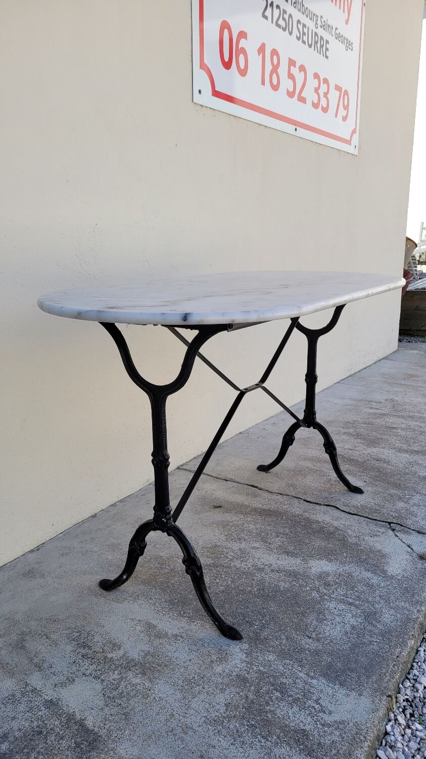 Cast iron bistro table and old oval marble top