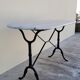 Cast iron bistro table and old oval marble top