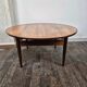 Round rosewood coffee table with adjustable height, Denmark, 1960.