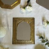 Oriental brass mirror