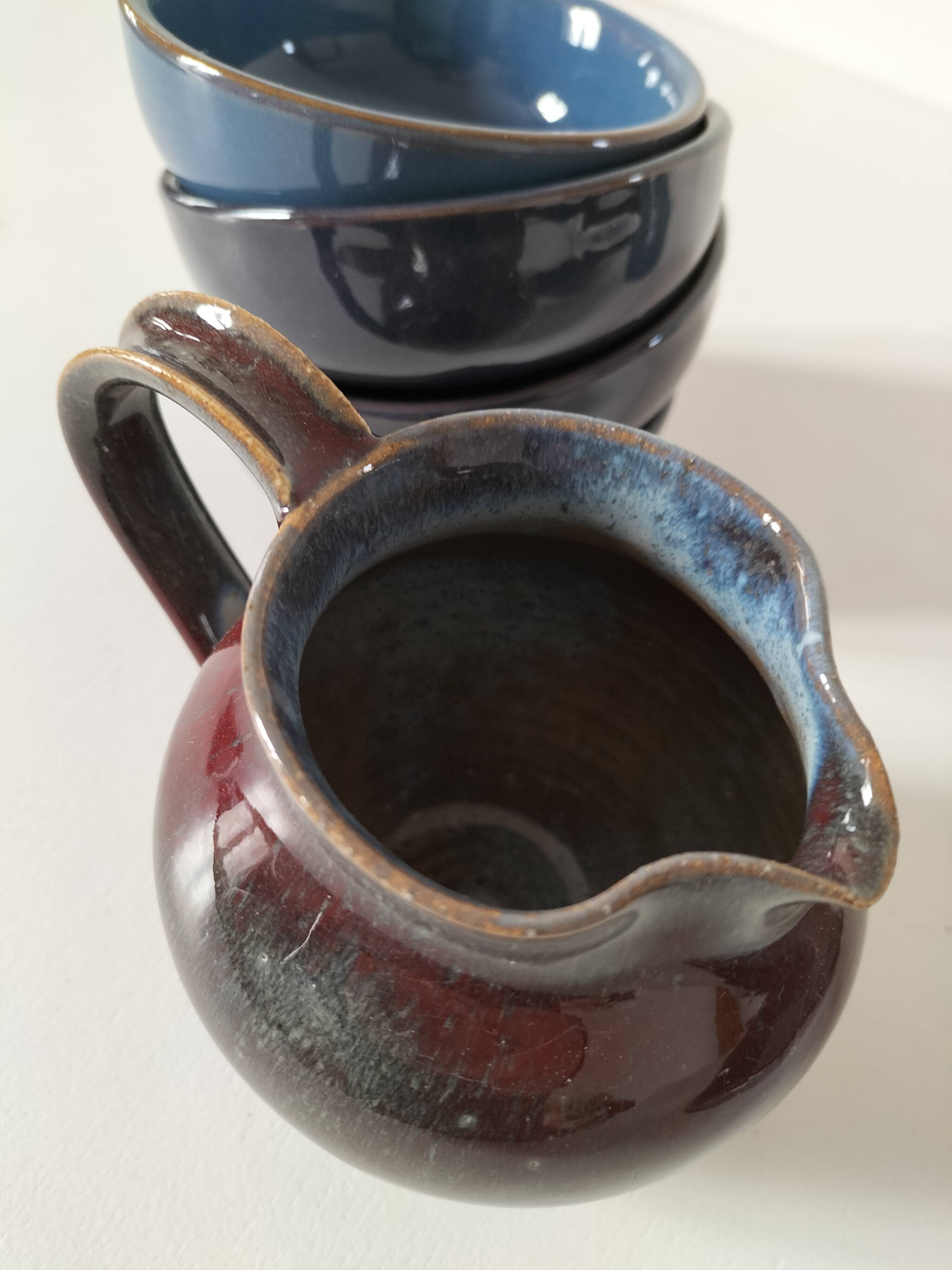 Set of artisanal ceramics in shades of blue.