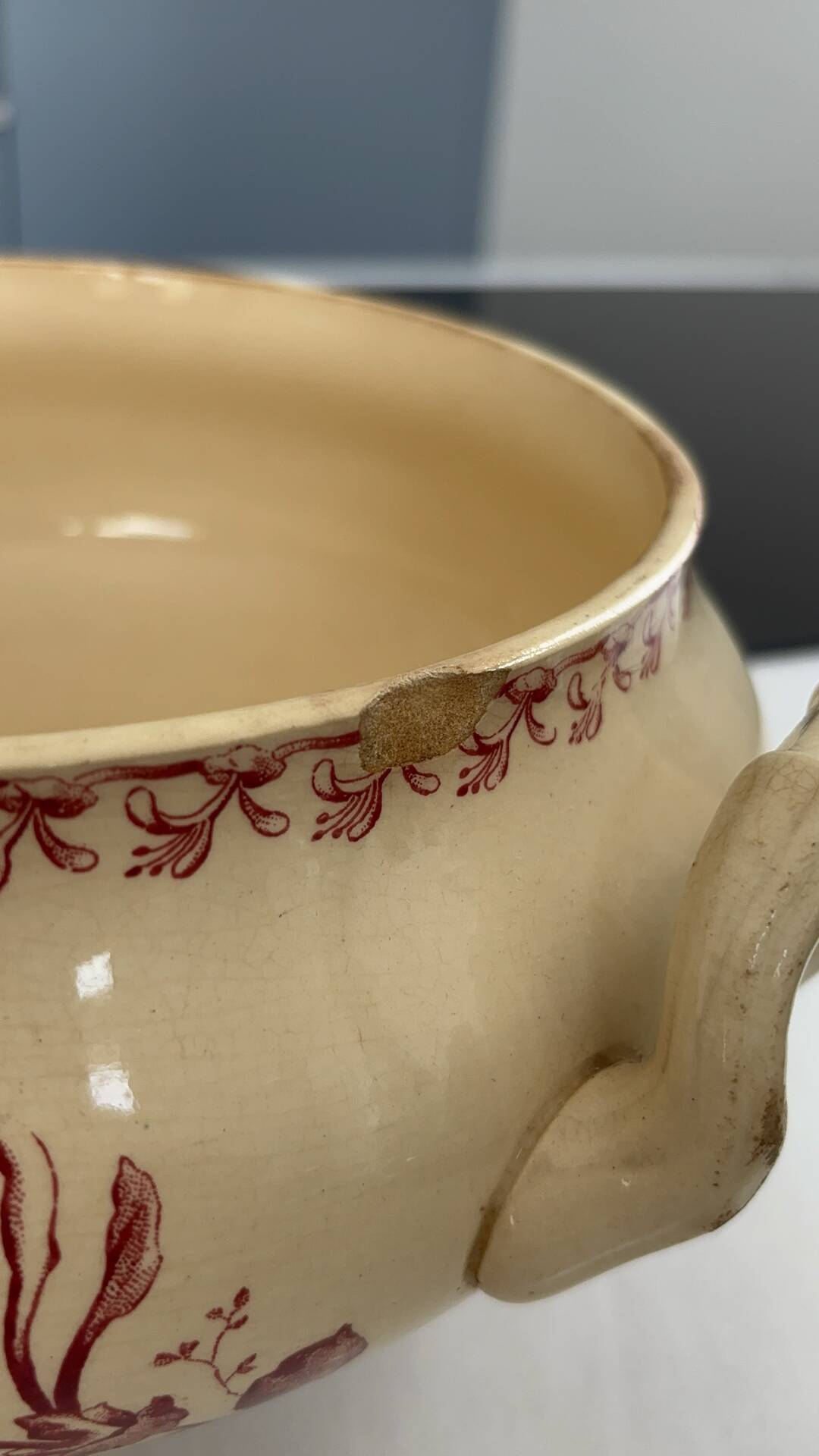 Red earthenware soup tureen, Gien factory, honeysuckle model.