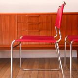 2 tubular chairs in red leather 1970