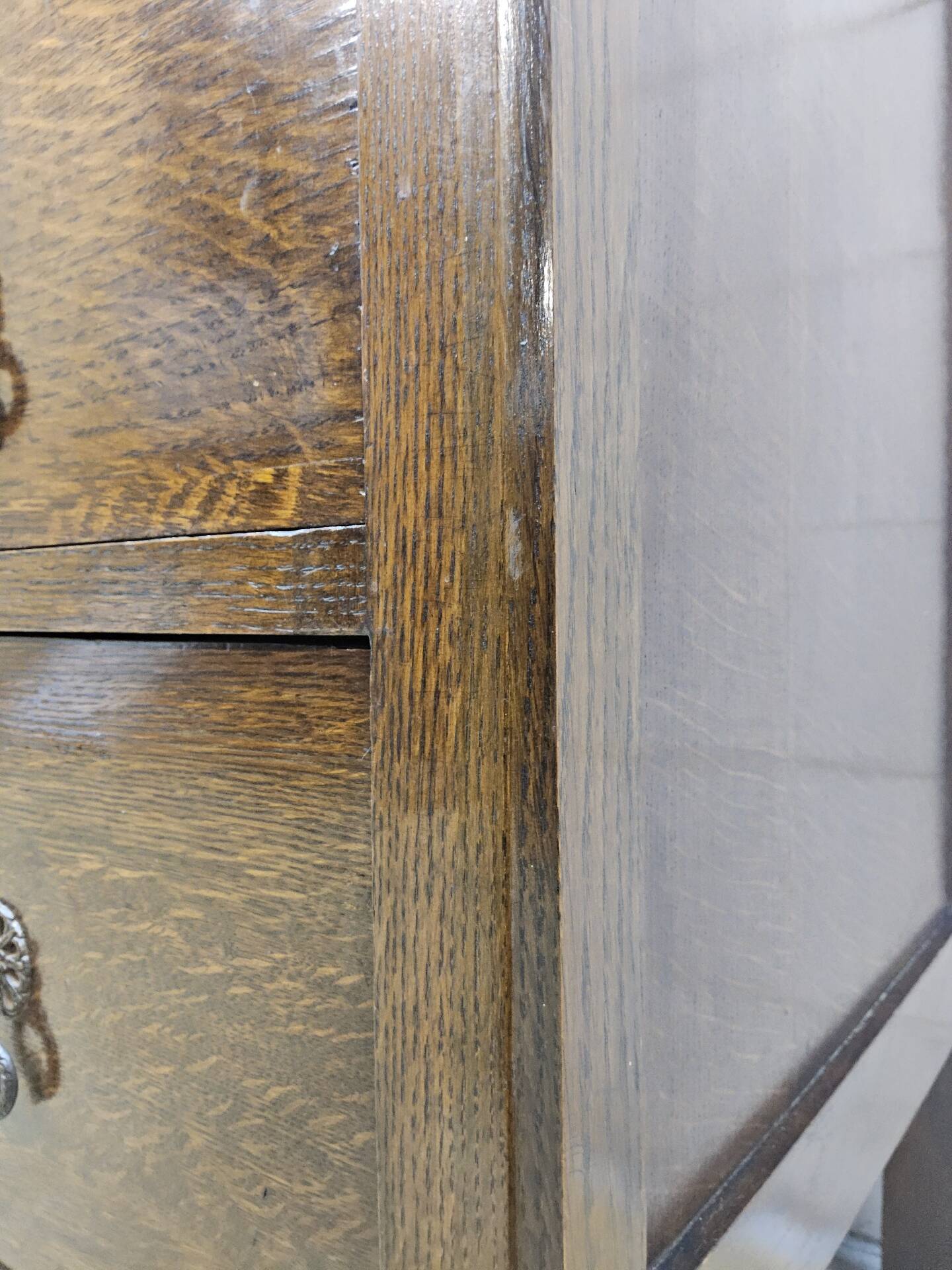 Antique chest of drawers on wheels with wood carving (key top drawer)