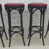 4 professional bistro stools with burgundy red imitation top in solid curved wood in the