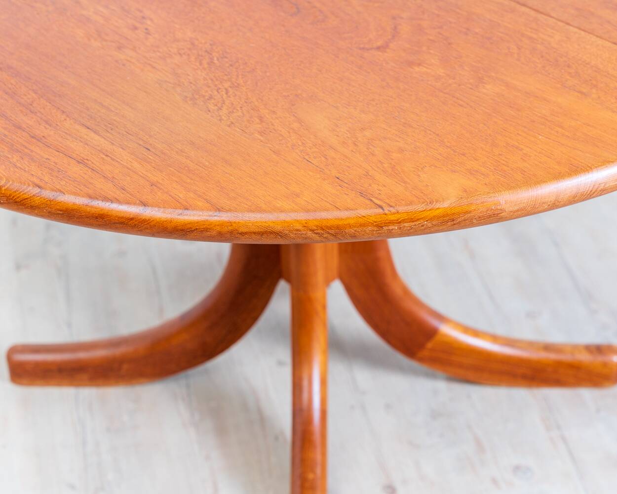 1970s solid teak dining table with Scandinavian design.