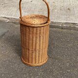 Round woven rattan and wicker umbrella holder with handle