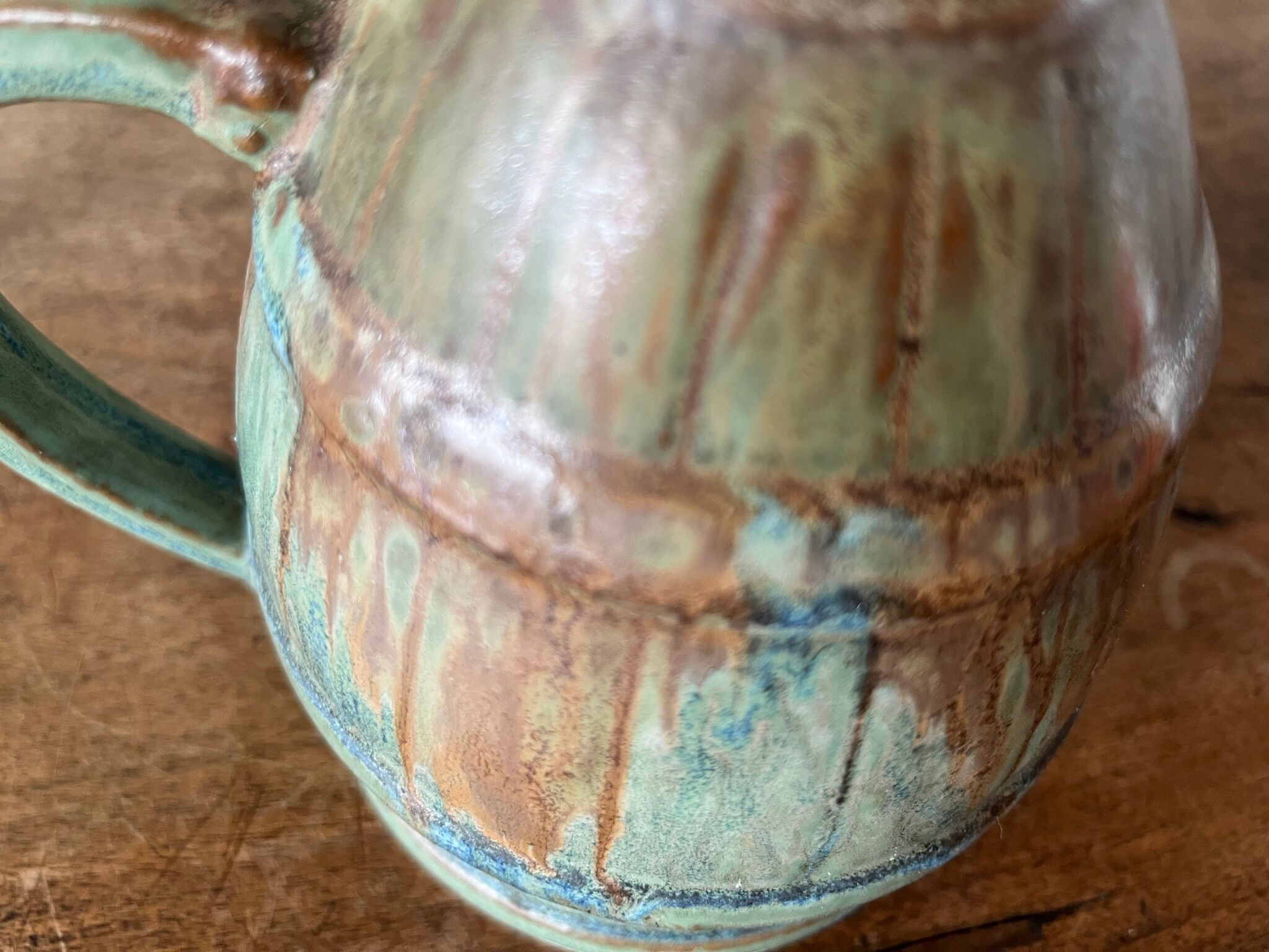 Pitcher in flamed sandstone