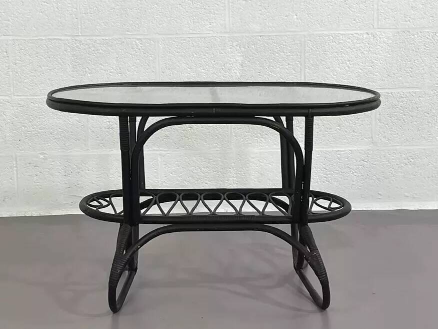 Black rattan and glass coffee table