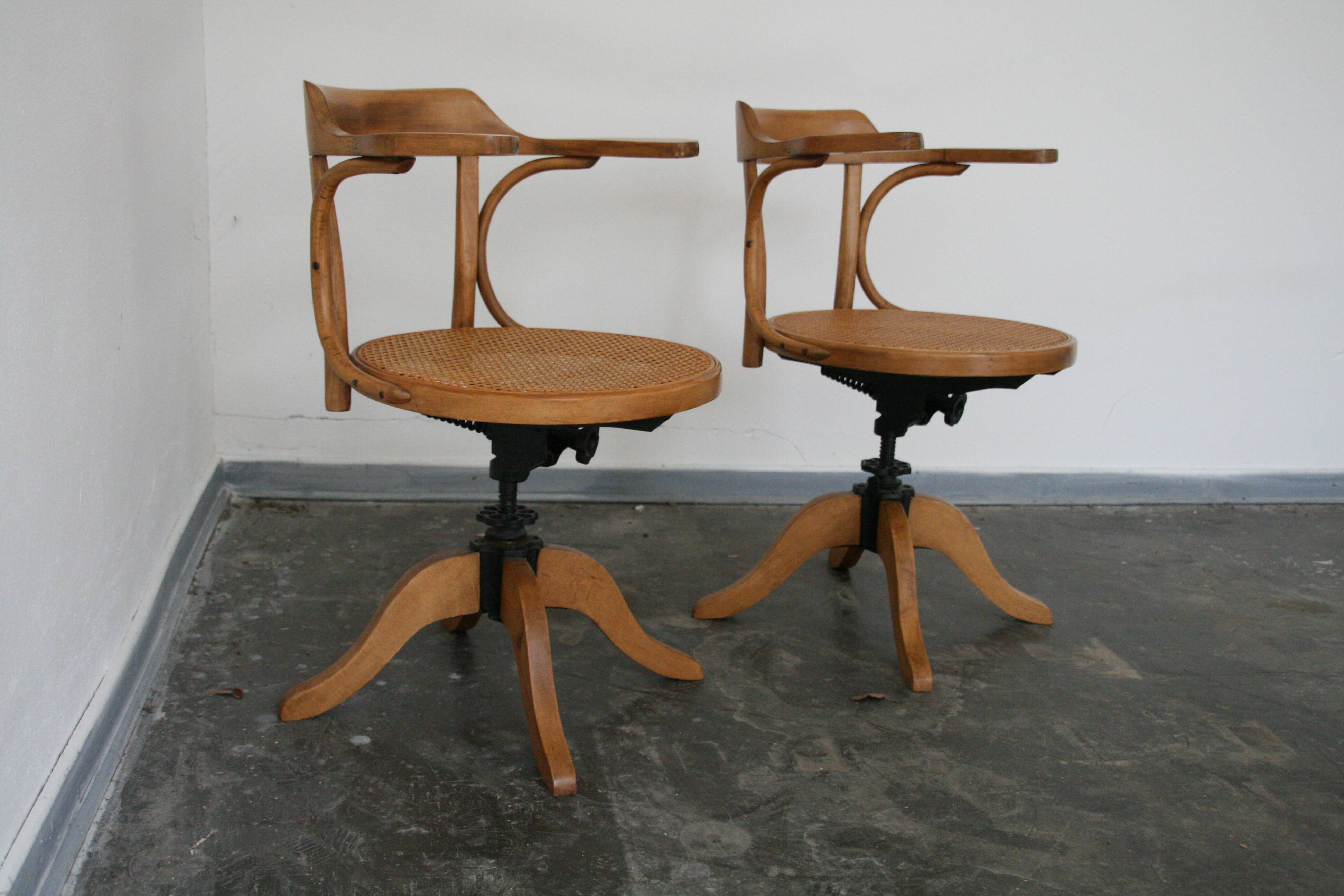 A pair of vintage bent wood svivel chairs by Salvaatore Leone Italy