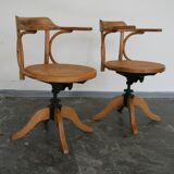 A pair of vintage bent wood svivel chairs by Salvaatore Leone Italy