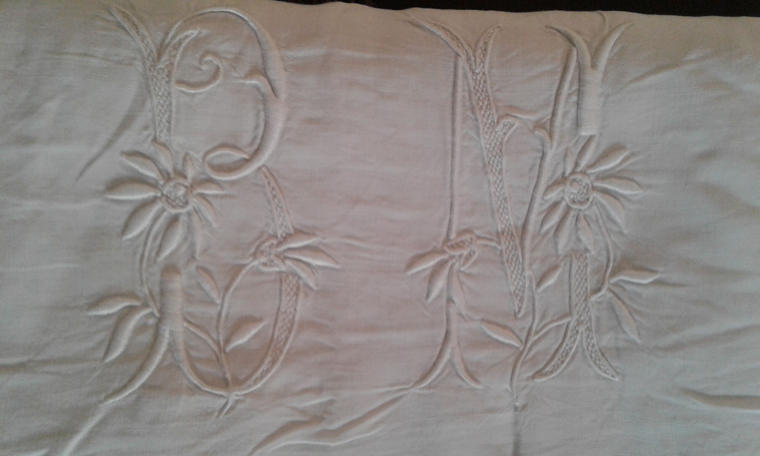 Lin Drap. monogramme embroidered B M and flowers.