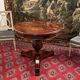 Gueridon in mahogany flame of the 19th century restoration