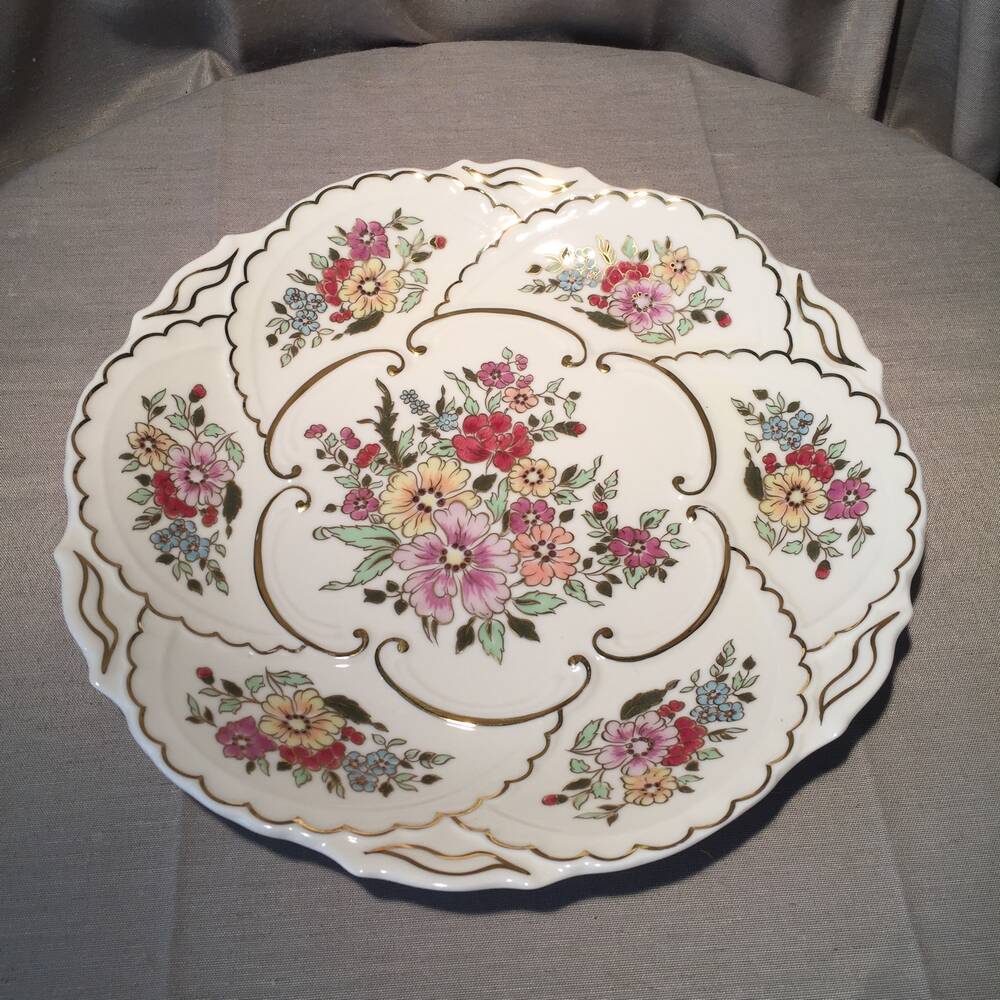 Plat a tarte ou plat decoratif porcelaine a decor floral