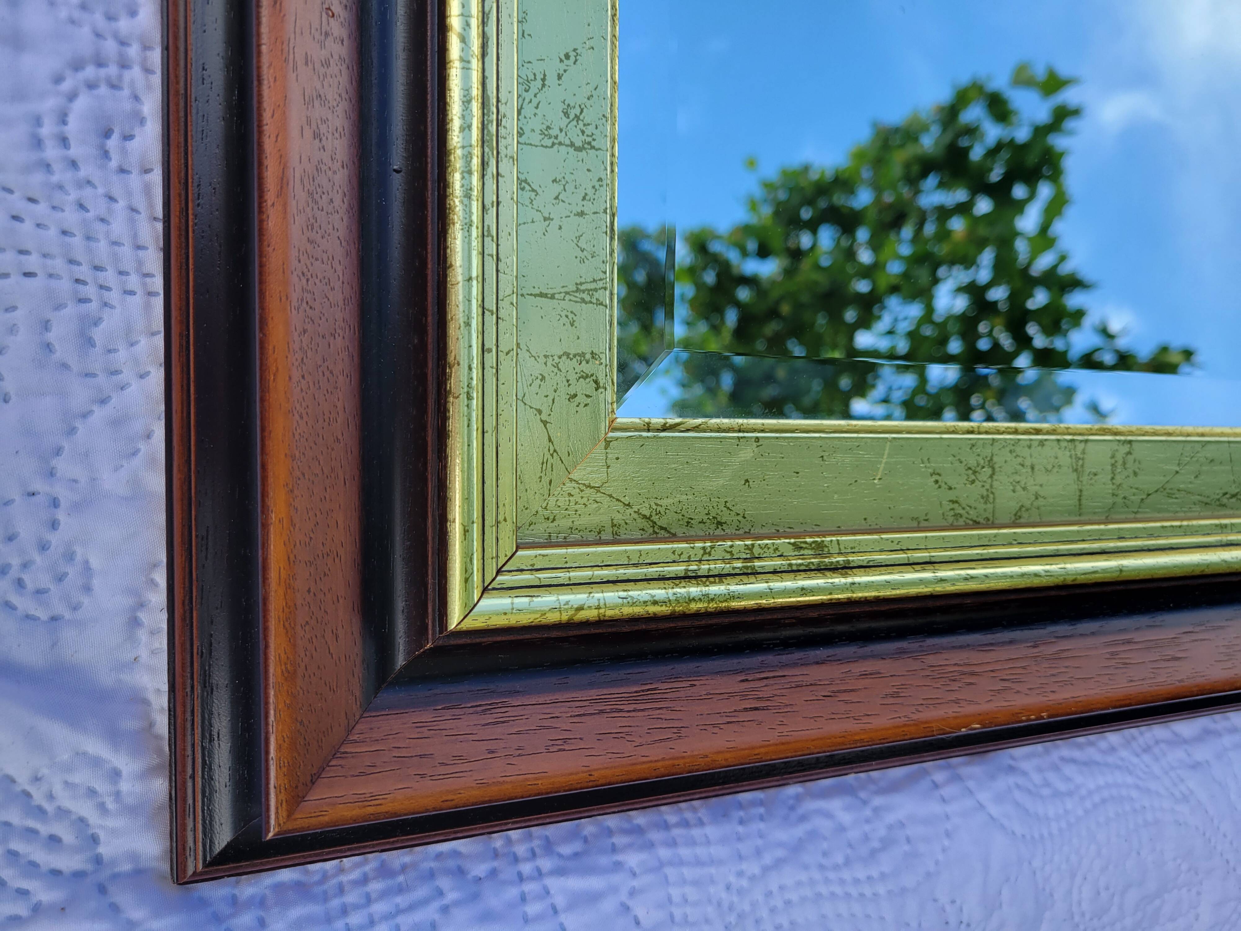 Large wooden and gold mirror