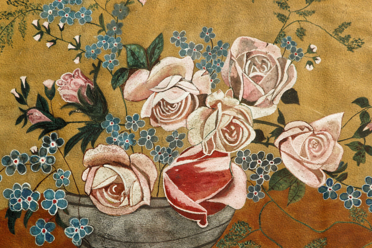 Bouquet of flowers in carved art deco frame