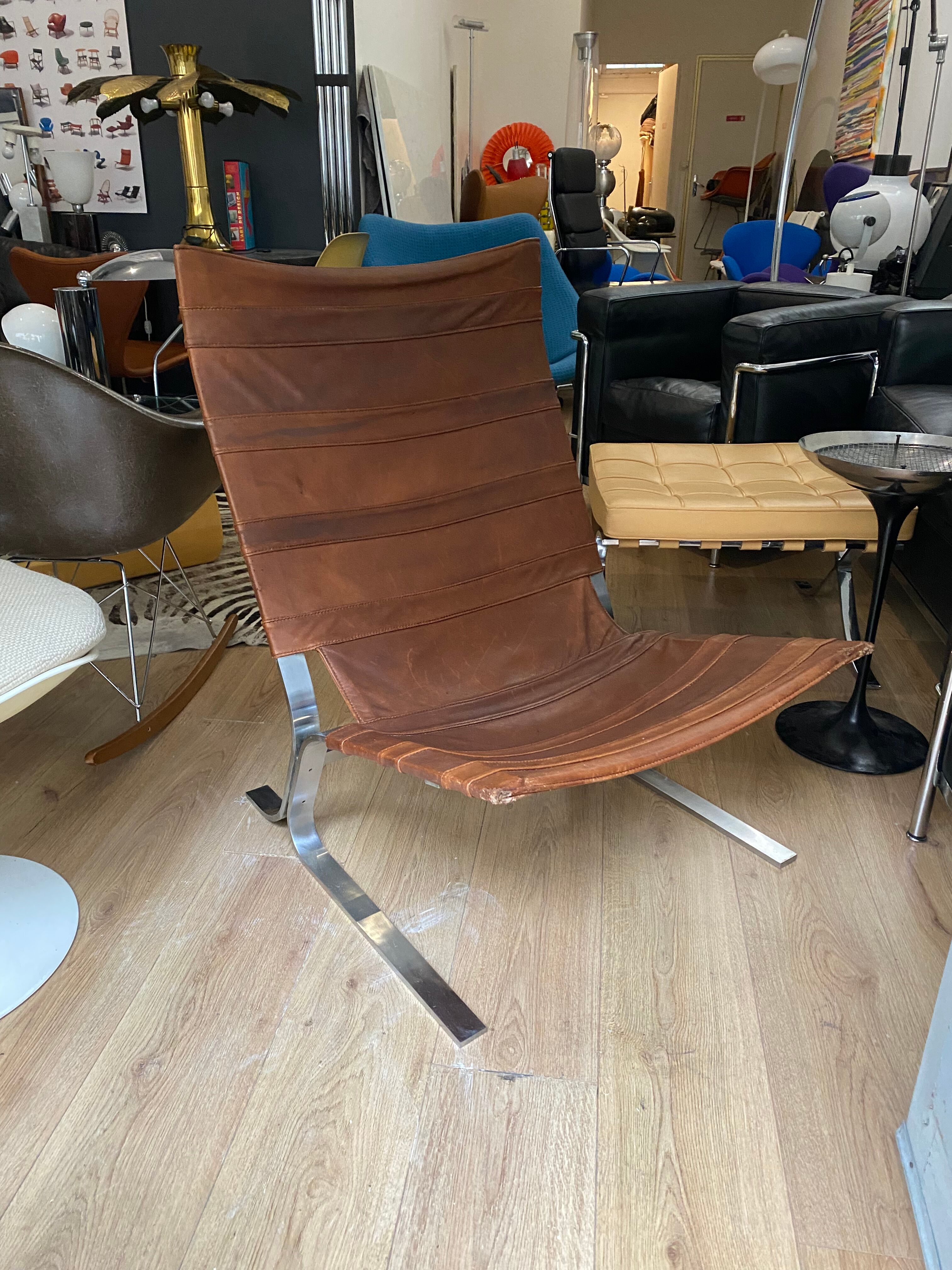 Vintage armchair design steel and leathers stretched 70s