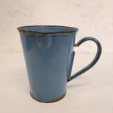 Old blue enamelled pitcher with spout
