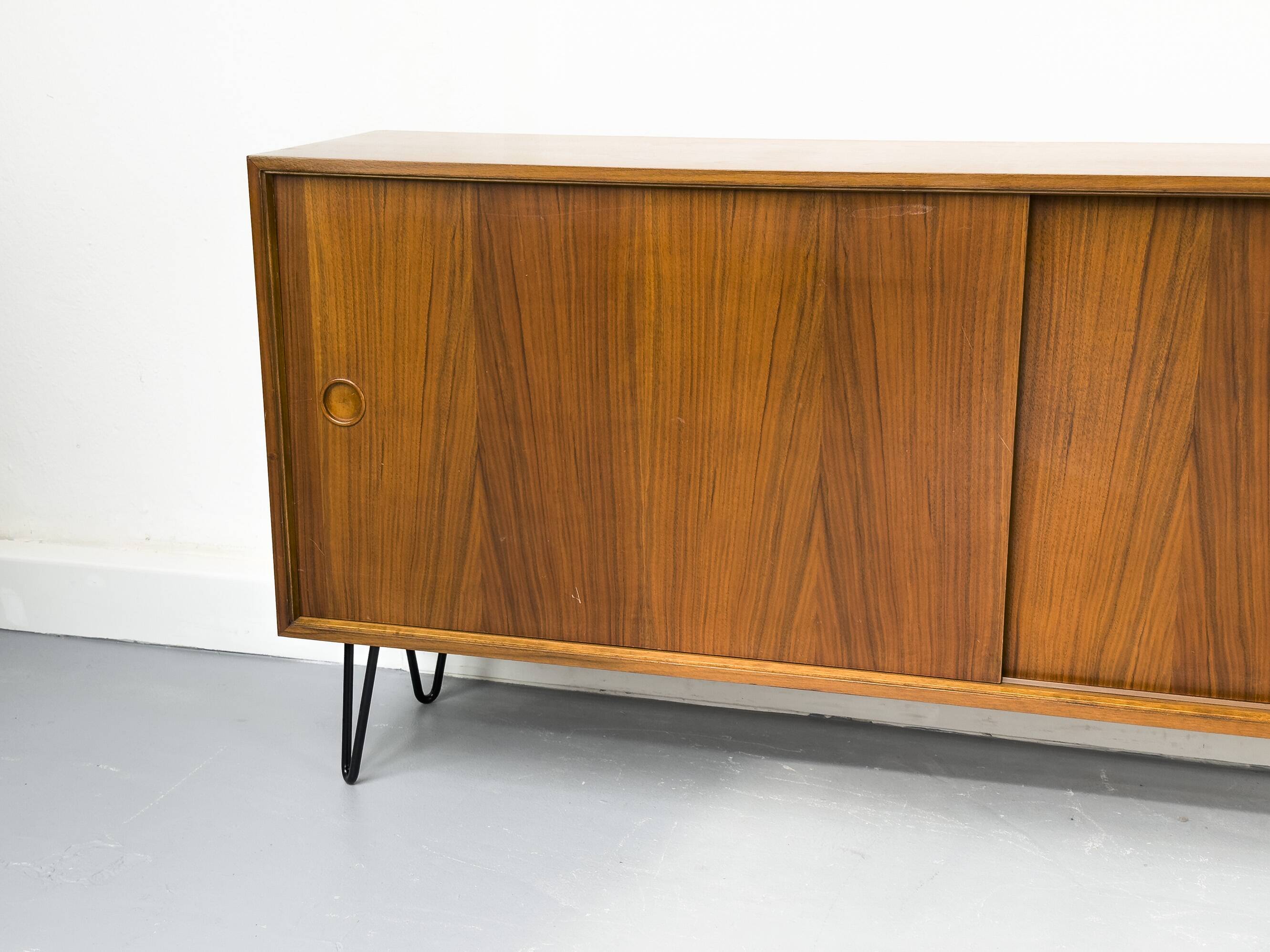 Walnut sideboard with sliding doors by Franzmeyer, 1959