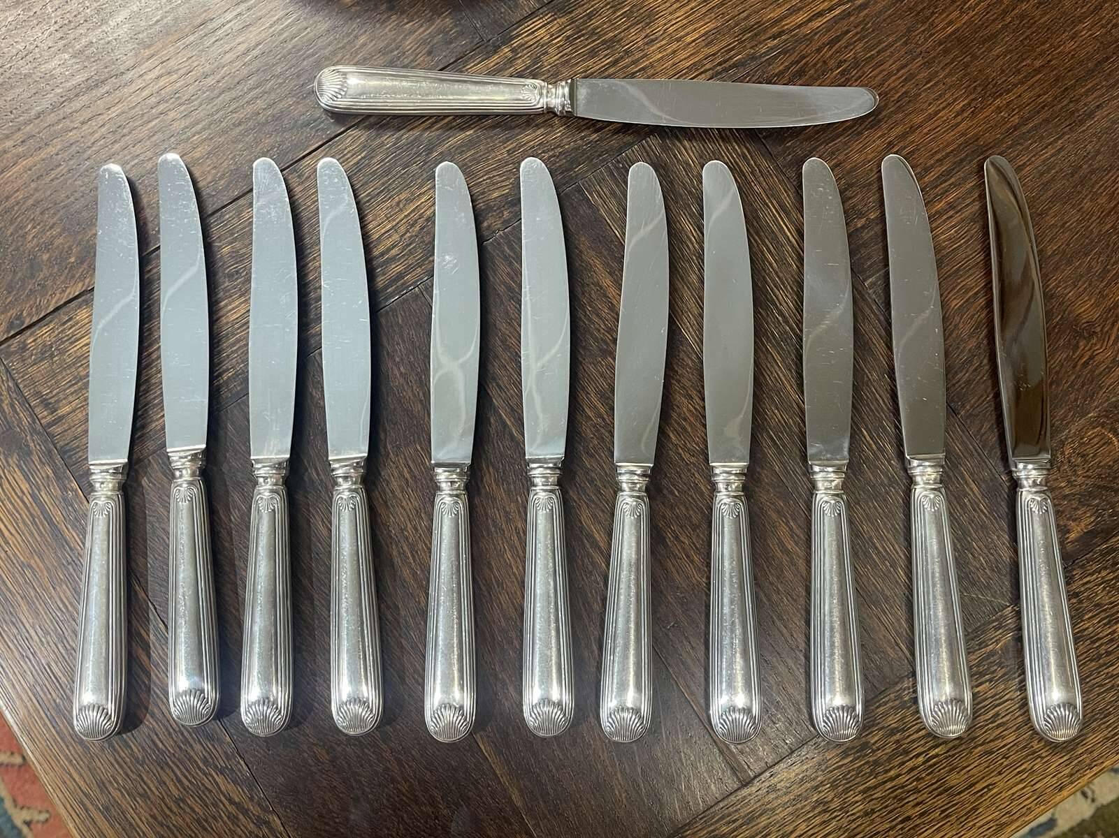 Set of 12 silver-plated metal knives, shell model, from CAILAR BAYARD
