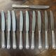 Set of 12 silver-plated metal knives, shell model, from CAILAR BAYARD