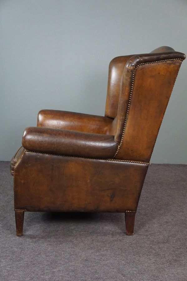 Patinated sheepskin armchair