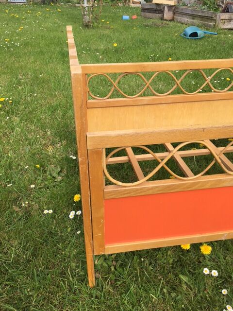 Wood and rattan baby bed